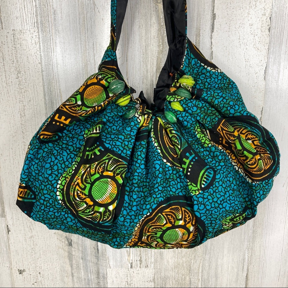 handmade travel hobo bag with paper bead design